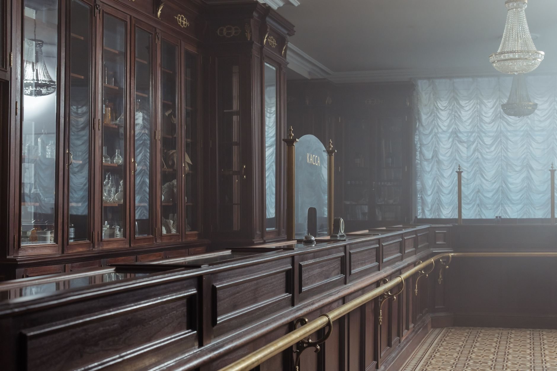 Warm pharmacy interior with wooden shelves and cabinets